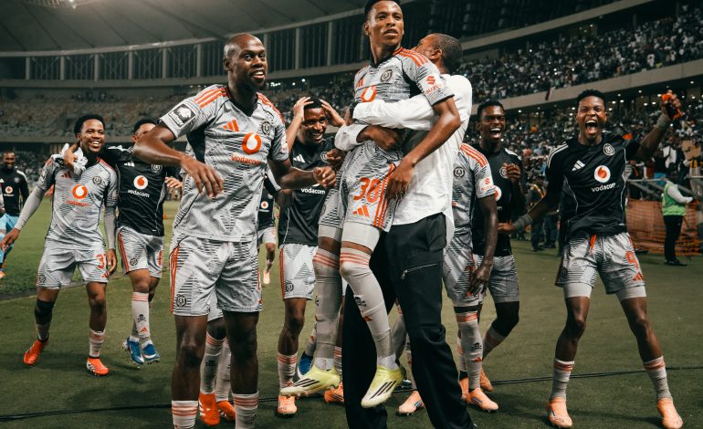 Abdelsam Ouaddou lifting Relebohile Mofokeng up