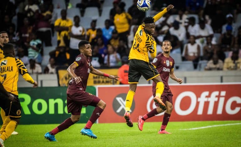 Thulani Mabaso vying for the ball with Mthetheleli Mthiyane