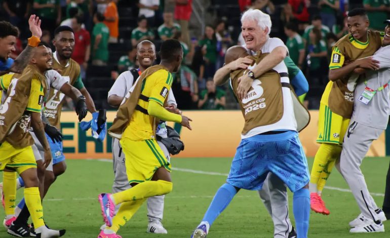 Hugo Broos hugs after South Korea win
