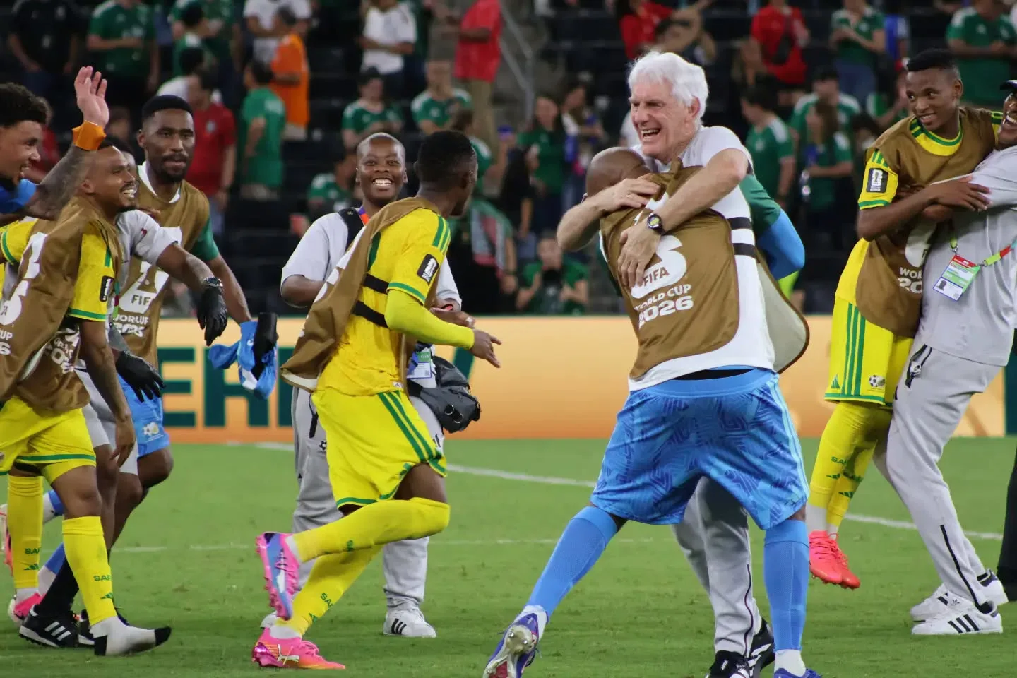 Hugo Broos hugs after South Korea win