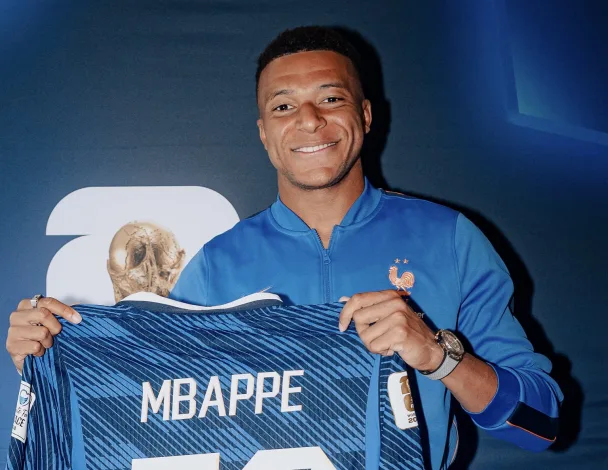 Kylian Mbappe with 58 jersey as he broke record