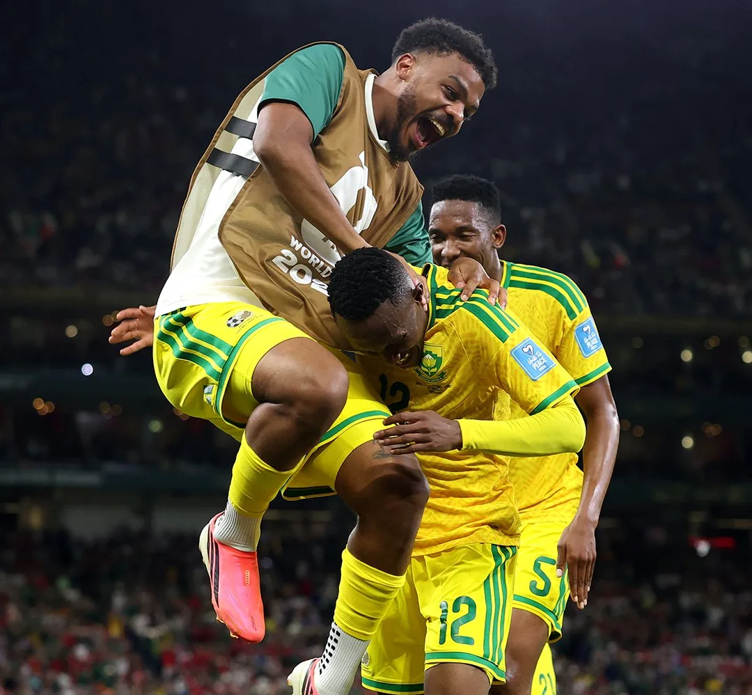 Lyle Foster celebrate with Maseko against South Korea