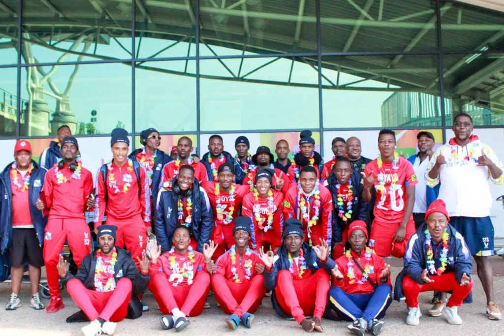 Milford team at airport after promotion