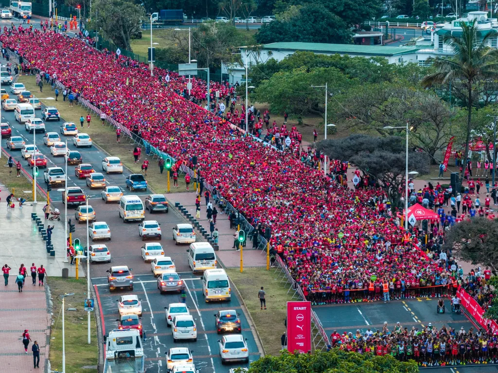 Cheptegei Produces World-class Display To Win Absa RUN YOUR CITY Durban 10K 1 Absa RUN YOUR CITY DURBAN 10K aerial of start by Tim Hay