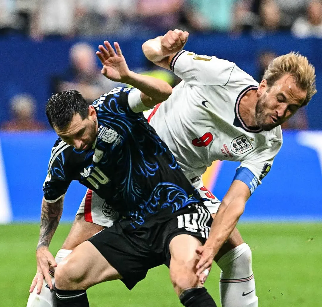 Lionel Messi battling with Harry Kane in the WC semis