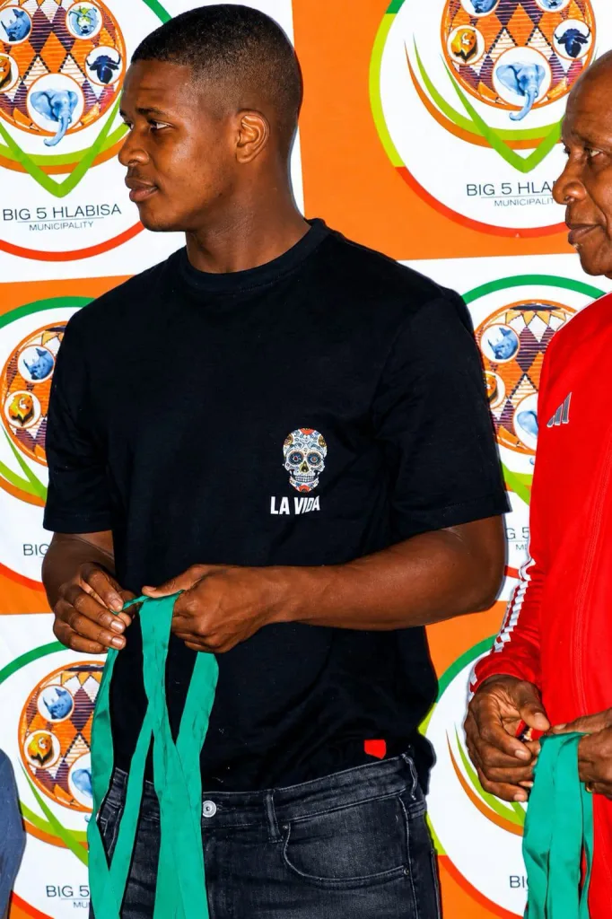 Mbekezeli Mbokazi handing out a medal in Umkhanyakude