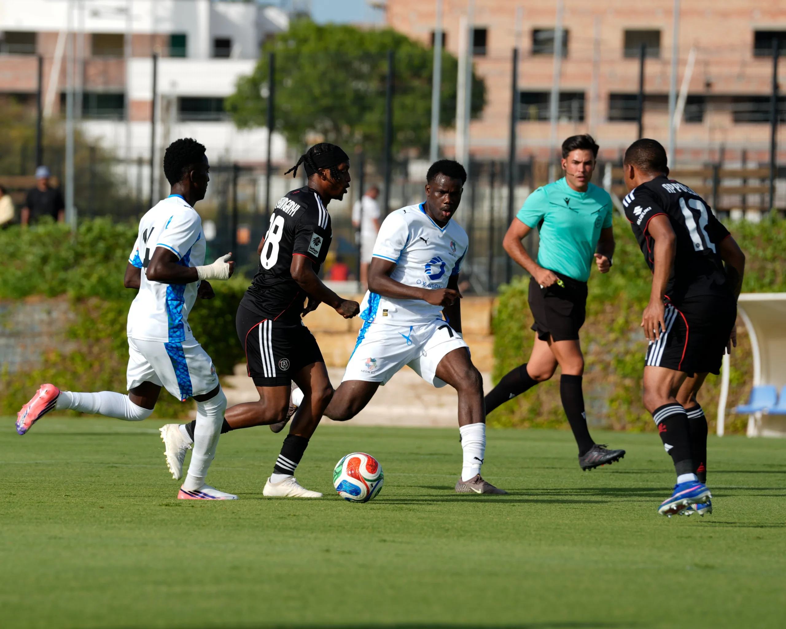 Saïd Benrahma Strikes As Christophe Galtier’s NEOM SC Edges Pirates 3 Patrick Maswanganyi against NEOM scaled jpeg