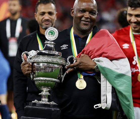 Mosimane Wants Standard Bank, Adidas As Payment Reward For Commercial Rights 2 Pitso Mosimane holding CAF Super Cup trophy