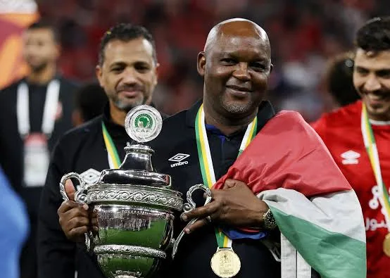 Mosimane Wants Standard Bank, Adidas As Payment Reward For Commercial Rights 4 Pitso Mosimane holding CAF Super Cup trophy