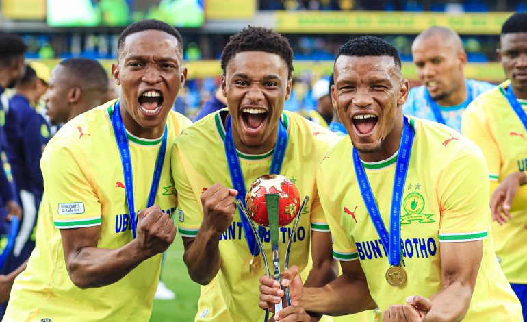 Mothobi Mvala, Grant Kekana and Mali Khoza holding FIFA Cup