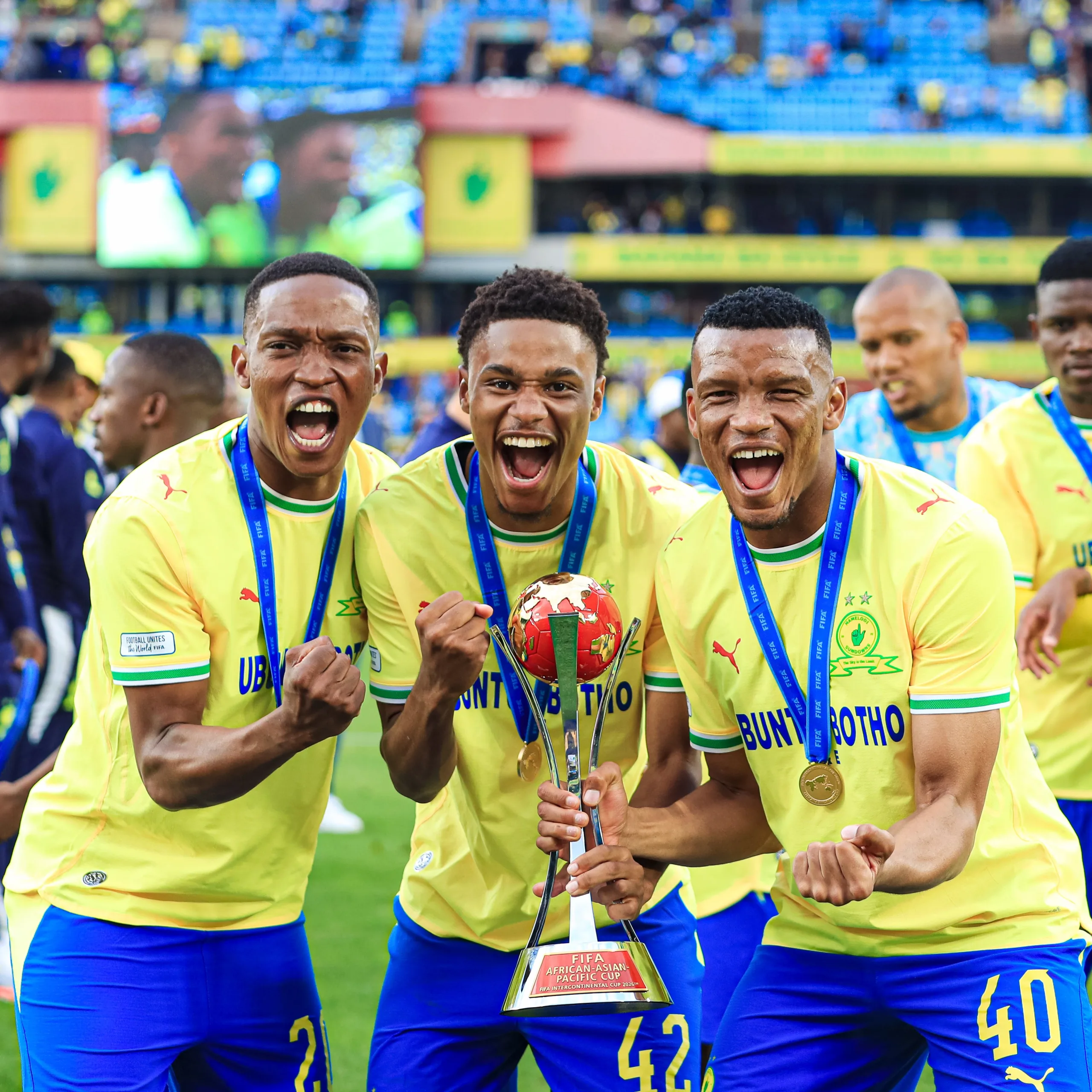 Kekana Insists Pirates' Rivalry Has Evolved Into Tactical Battle 5 Mothobi Mvala, Grant Kekana and Mali Khoza holding FIFA Cup