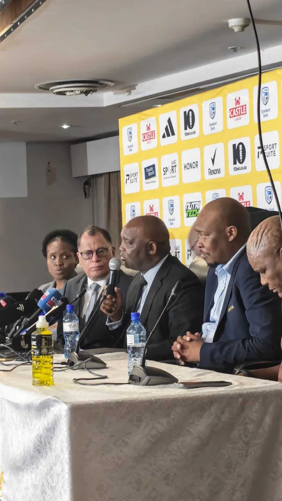 Pitso Mosimane alongside Danny Jordaan on 1 September