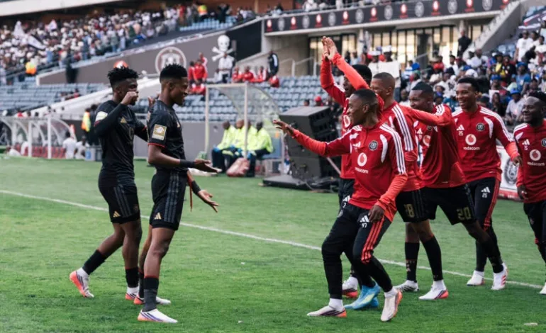 Yanela Mbuthuma celebrate against La Cure Waves in CAF