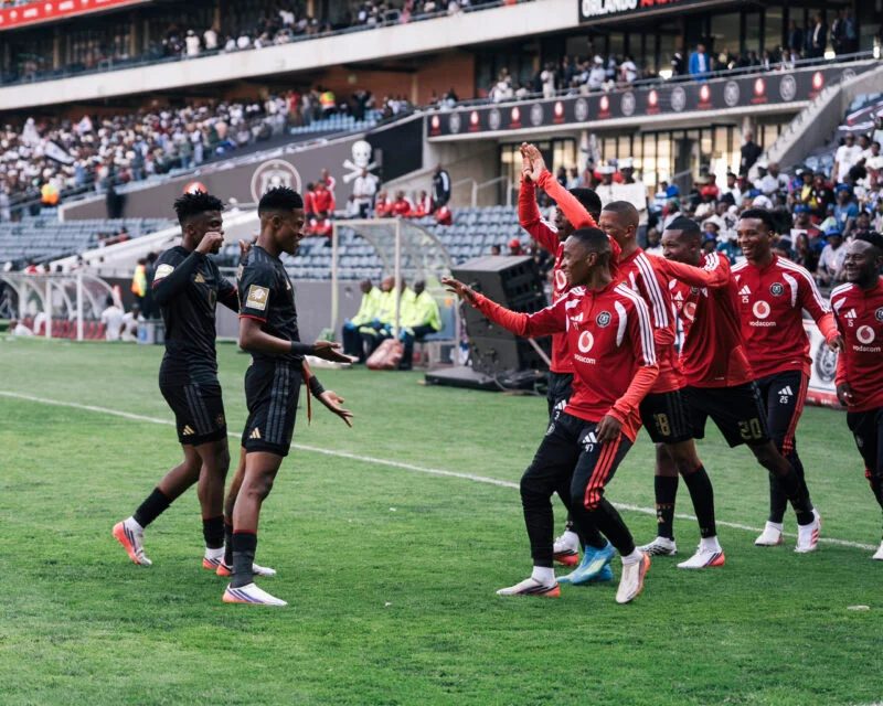 Yanela Mbuthuma celebrate against La Cure Waves in CAF