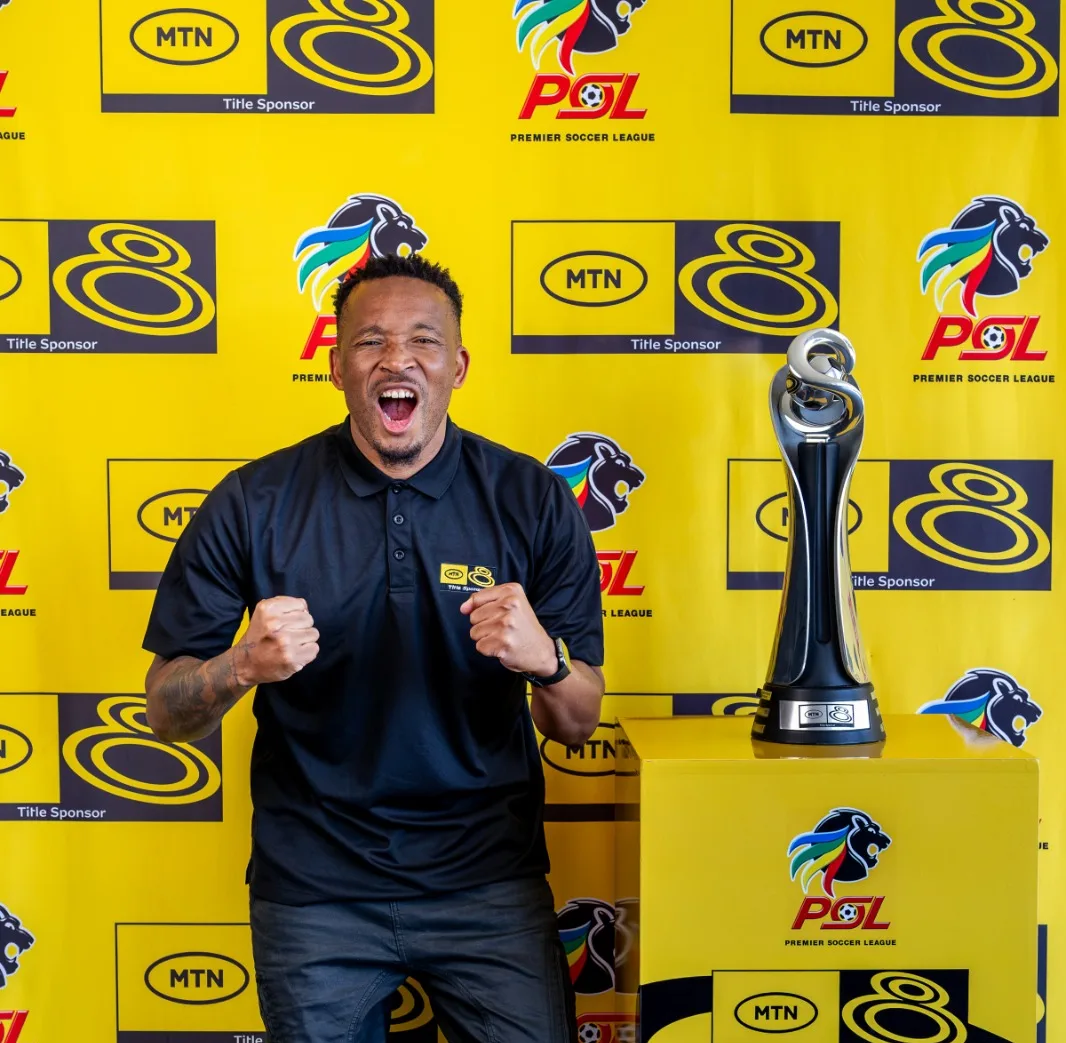 Lehlohonolo Majoro with MTN8 trophy