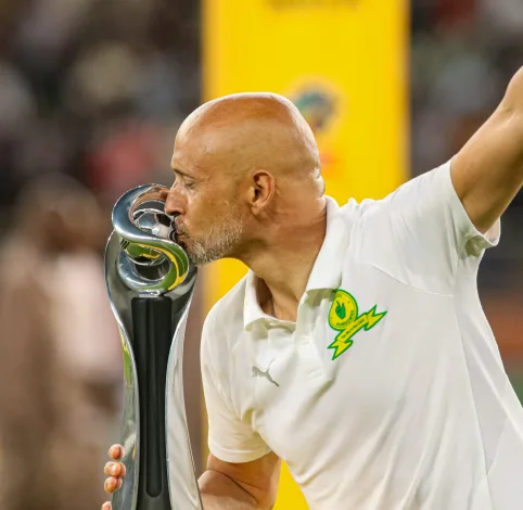 Miguel Cardoso kissing the MTN8