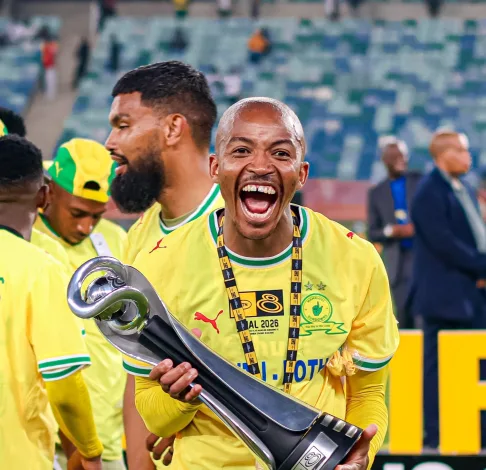 Thapelo Morena holding the MTN8 trophy